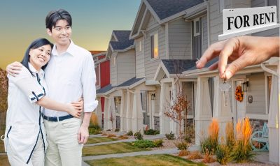 an Asian couple in front of a townhouse community with a hand offering them the keys and a for rent sign on one of the houses